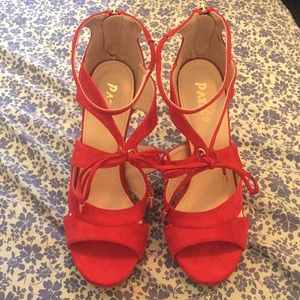 selling a red heel they are size 6 1/2 in women